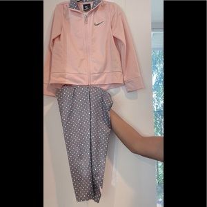 Adorable Nike track suit set. Pink/gray w/ polka dots. Great condition. Size 3.